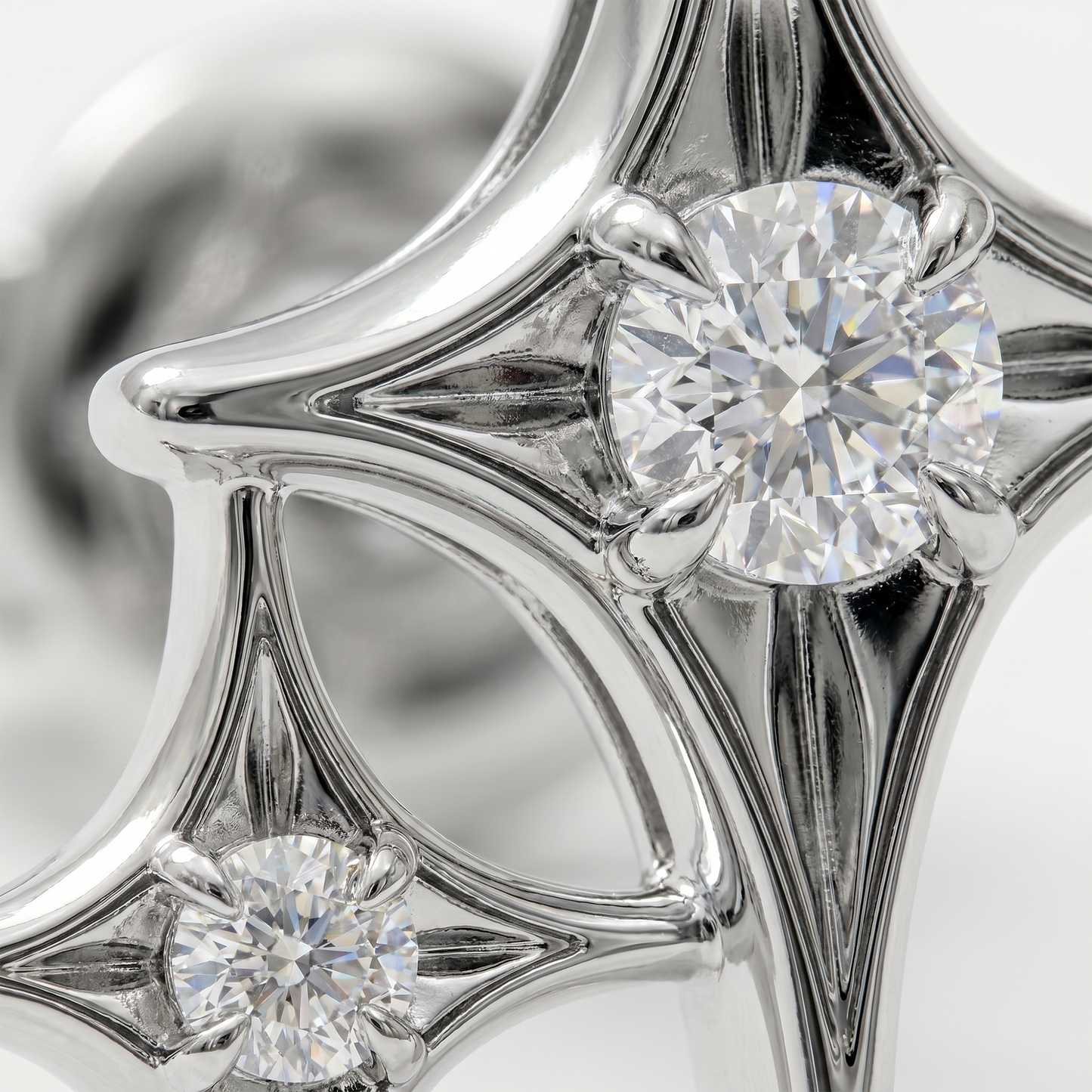 Close-up diamond star earrings in white gold, fine jewellery detail with brilliant cut diamonds