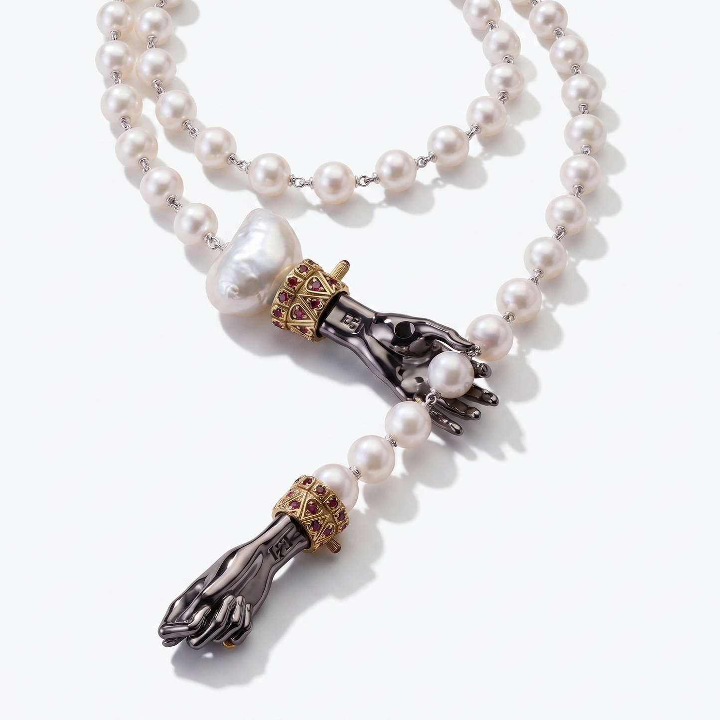 Statement pearl necklace with twin black hand pendants, baroque pearls and gold ruby elements, modern artistic jewellery