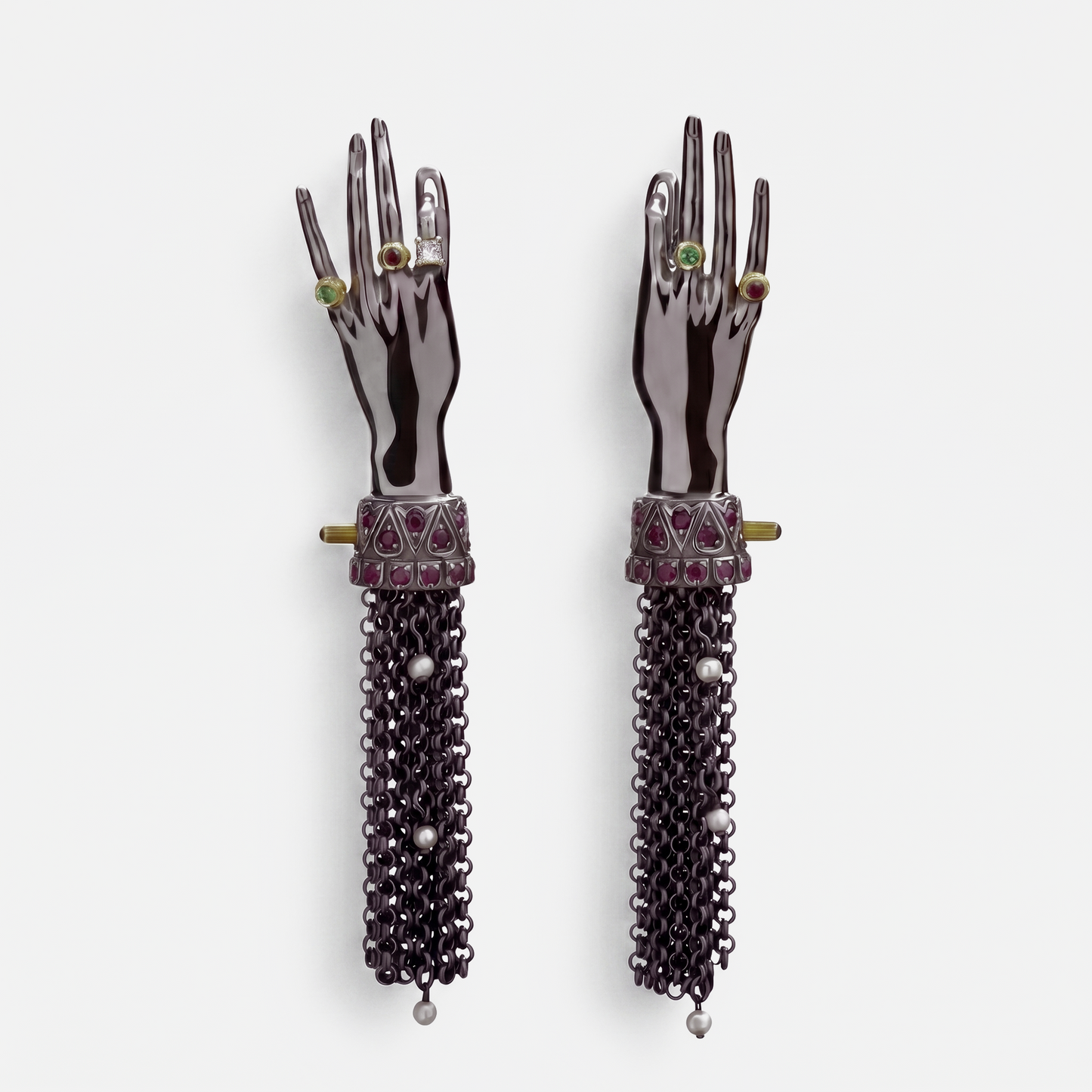 Pair of black hand-shaped drop earrings with gemstone rings and chain tassels, statement designer jewellery