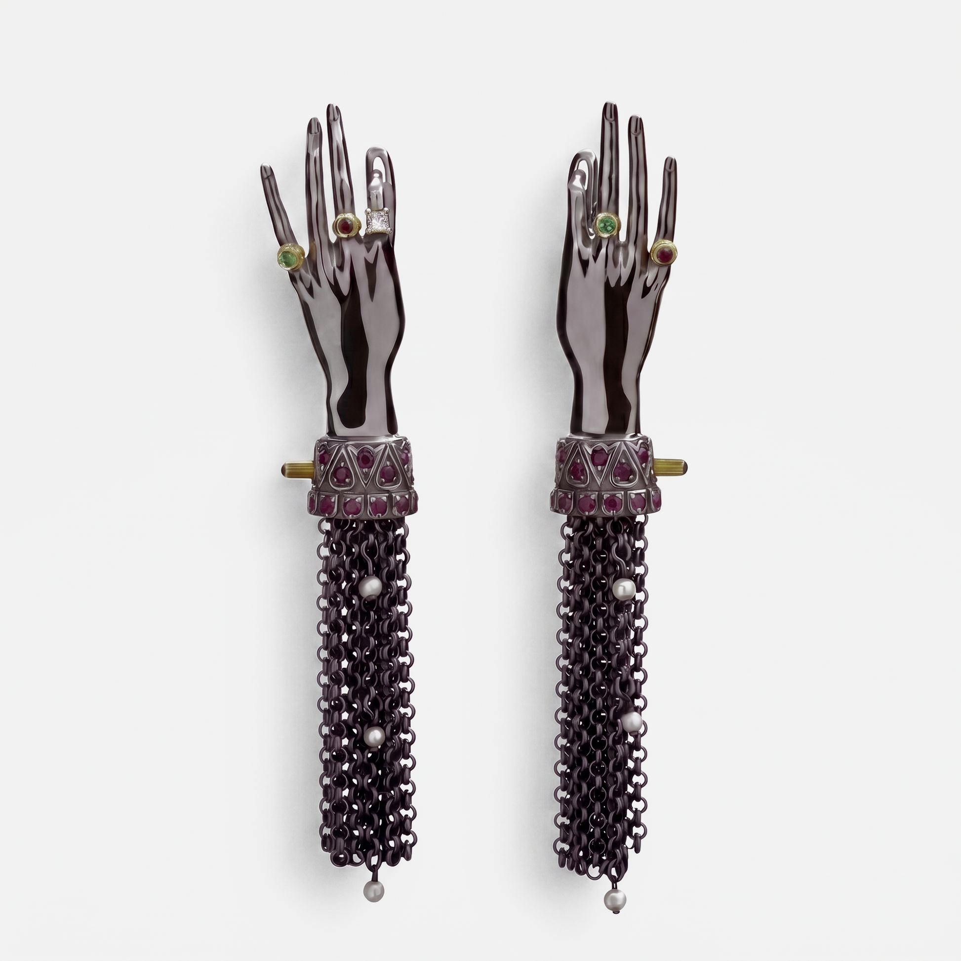 Pair of black hand-shaped drop earrings with gemstone rings and chain tassels, statement designer jewellery