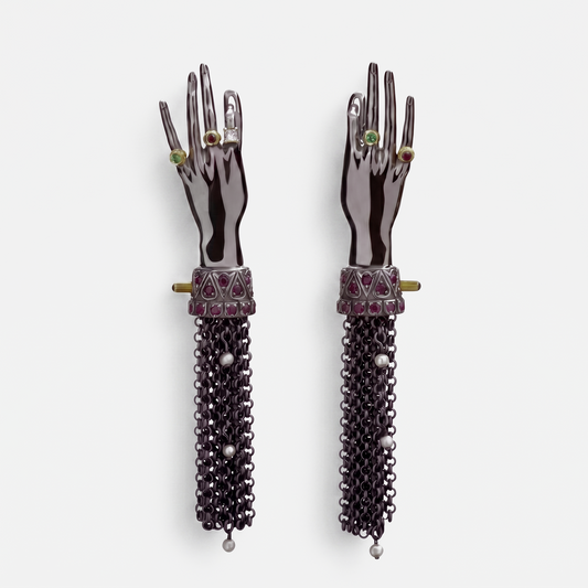 Pair of black hand-shaped drop earrings with gemstone rings and chain tassels, statement designer jewellery