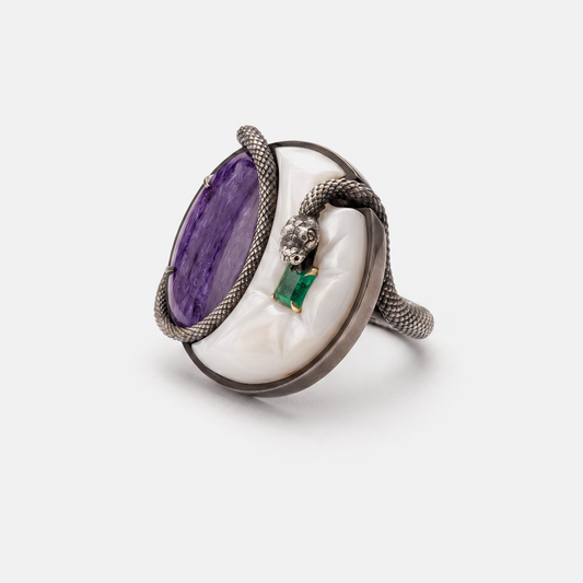 Statement designer ring with purple gemstone, green emerald and snake detail, contemporary British jewellery