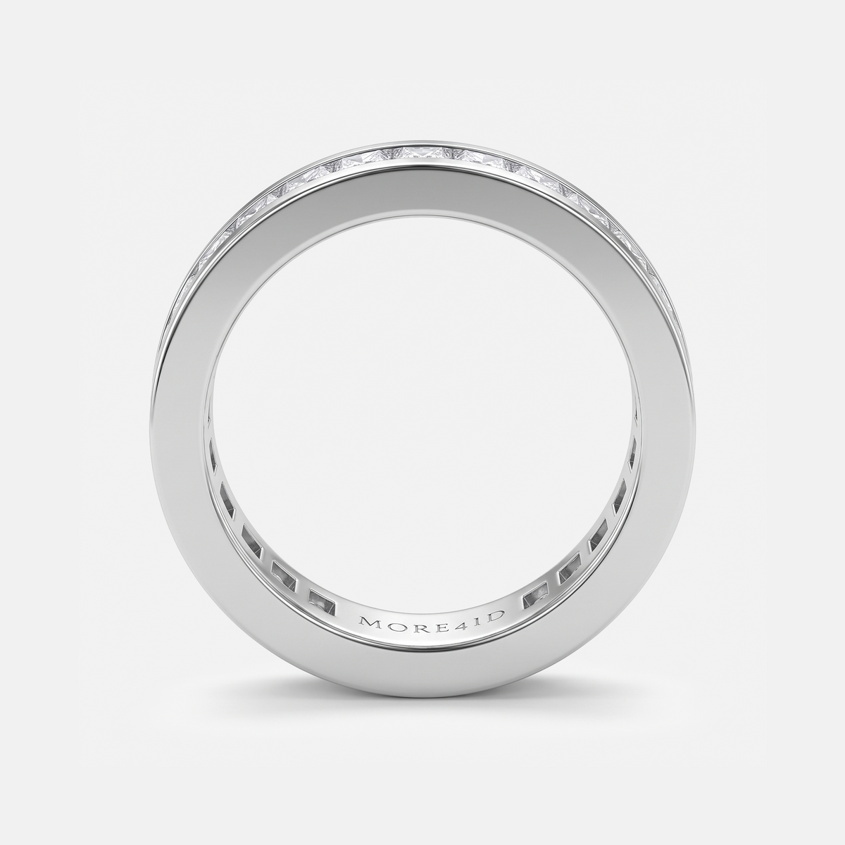 A polished silver-tone eternity ring with a continuous channel-set diamond band, shown from a top-down perspective on a light gray background.