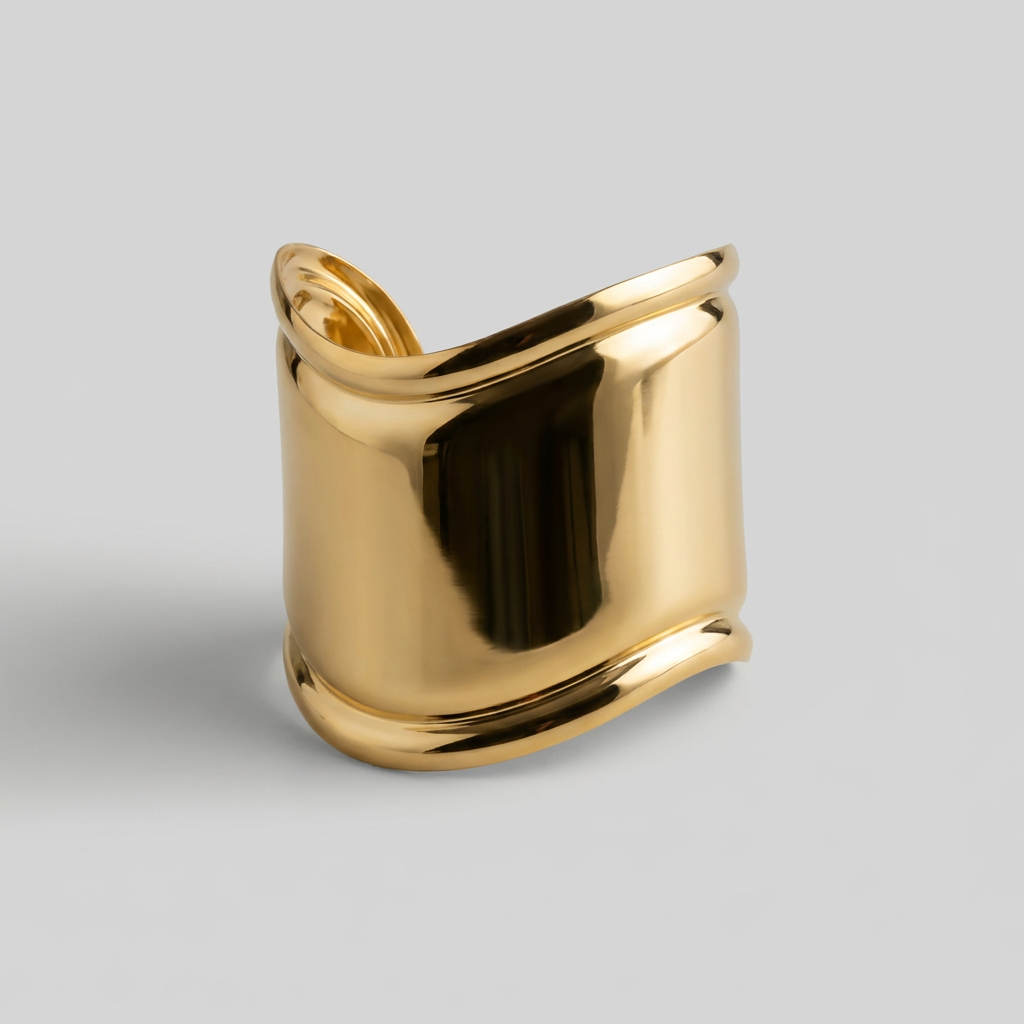 Gold bracelet displayed on a light gray background