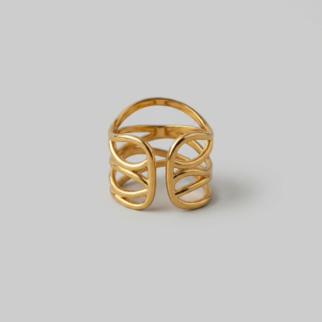 Gold bracelet with a unique design on a gray background